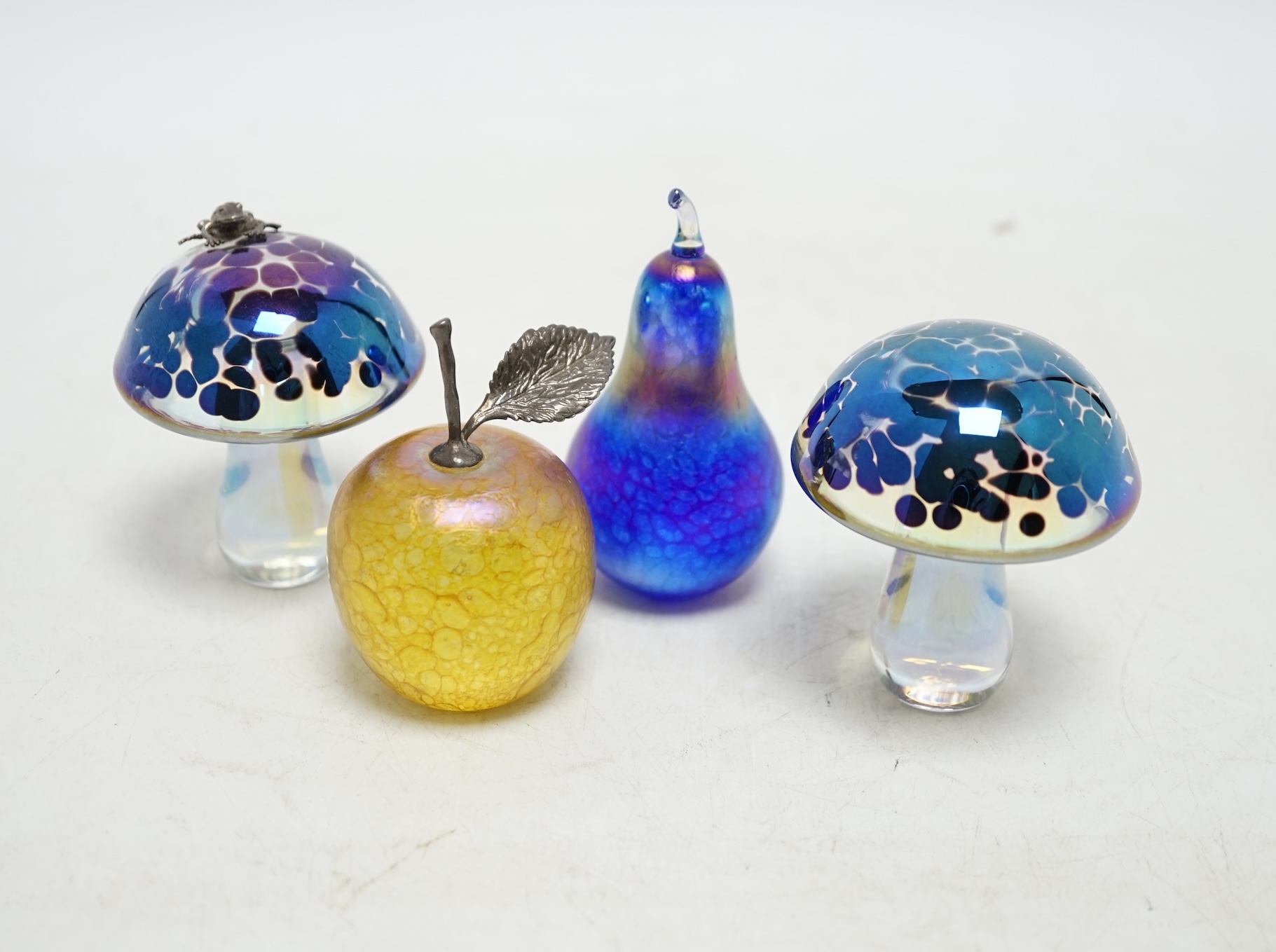 Four Glasform fruit and mushroom paperweights, including John Ditchfield design, tallest 9cm. Condition - good